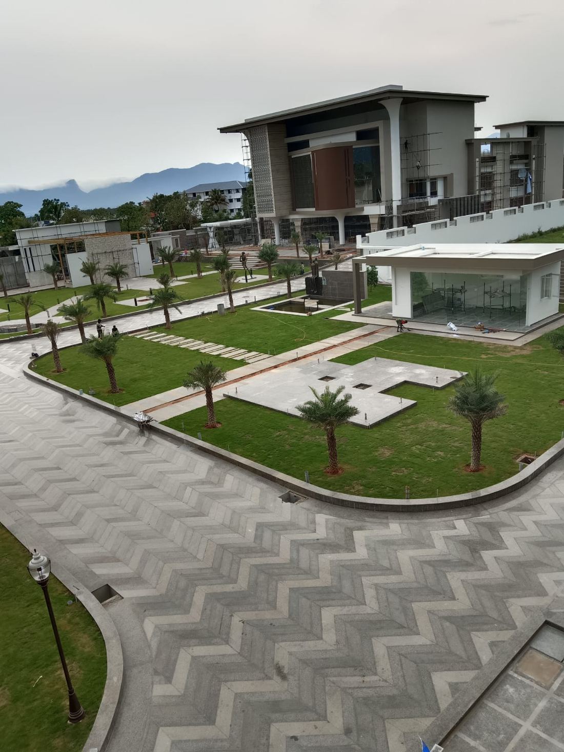 Herringbone hardscape and lawn terracing at a corporate headquarters