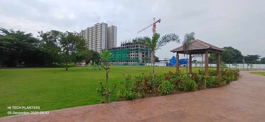 Open lawn and gazebo seating within a residential township